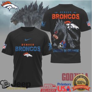 Godzilla x Denver Broncos United In Orange Football Graphic Tee Godzilla x Denver Broncos United In Orange Football Graphic Tee