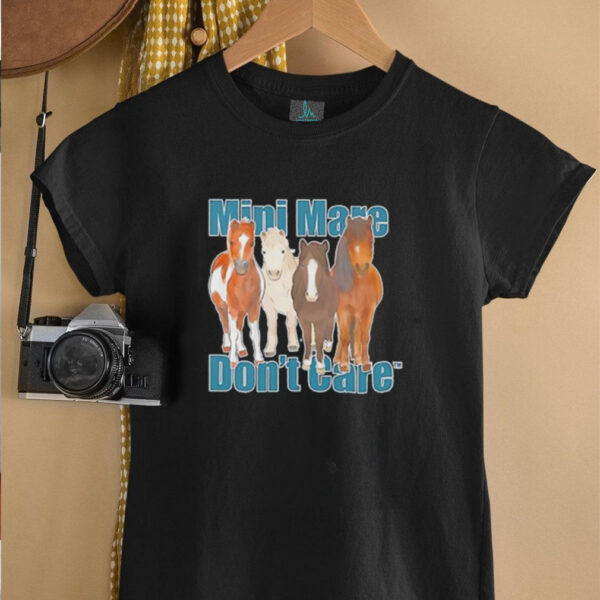 Katie Van Slyke Mabry Wearing Mini Mare Don’t Care shirt