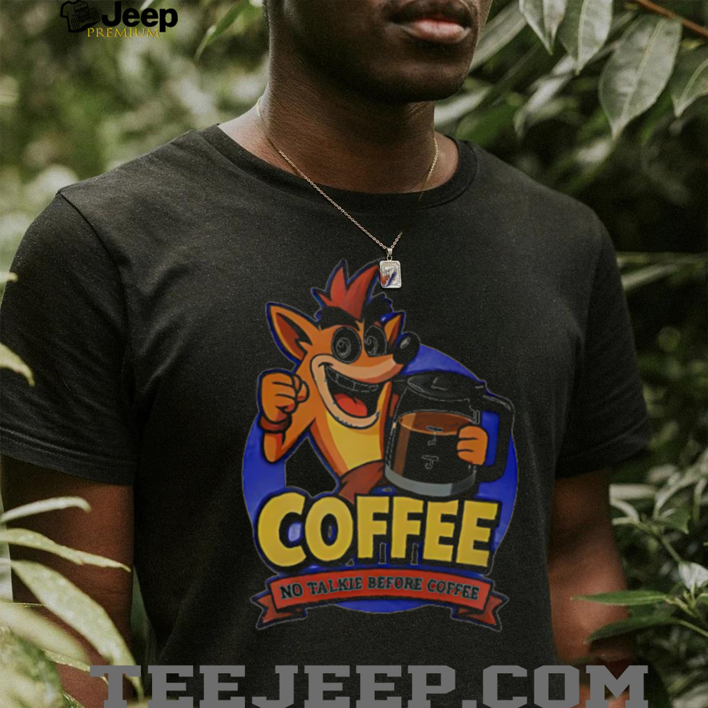 Person wearing the Coffee no talkie before coffee shirt, possibly holding a coffee mug