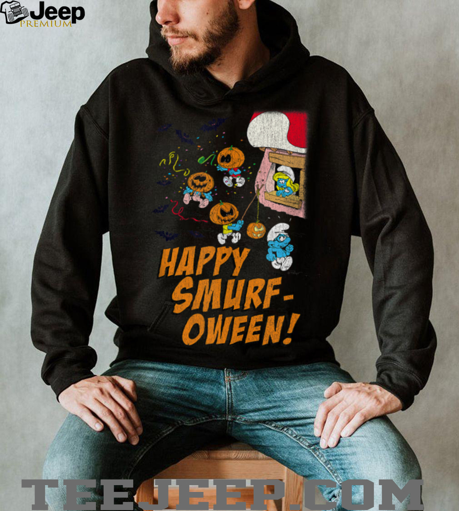 Close-up of Smurfs characters carving a pumpkin on the shirt