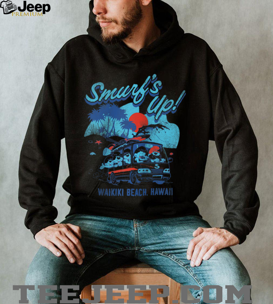 Close-up of Smurfs characters by a retro beach van on the shirt