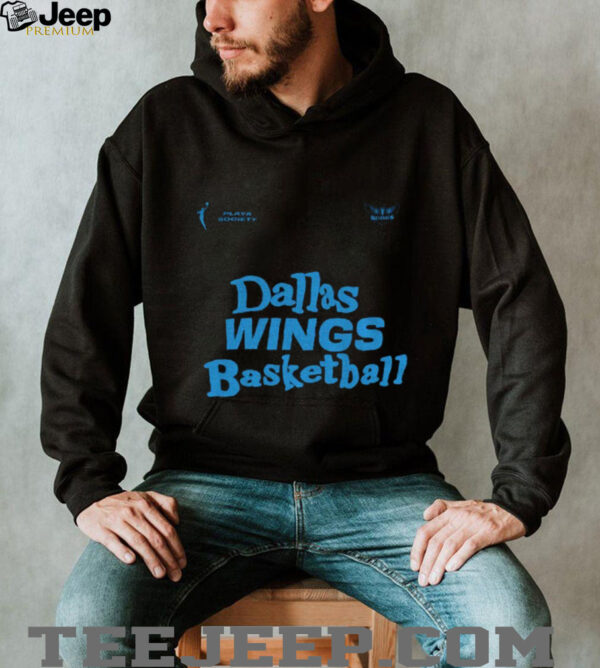 Paige Bueckers wearing Dallas Wings basketball shirt