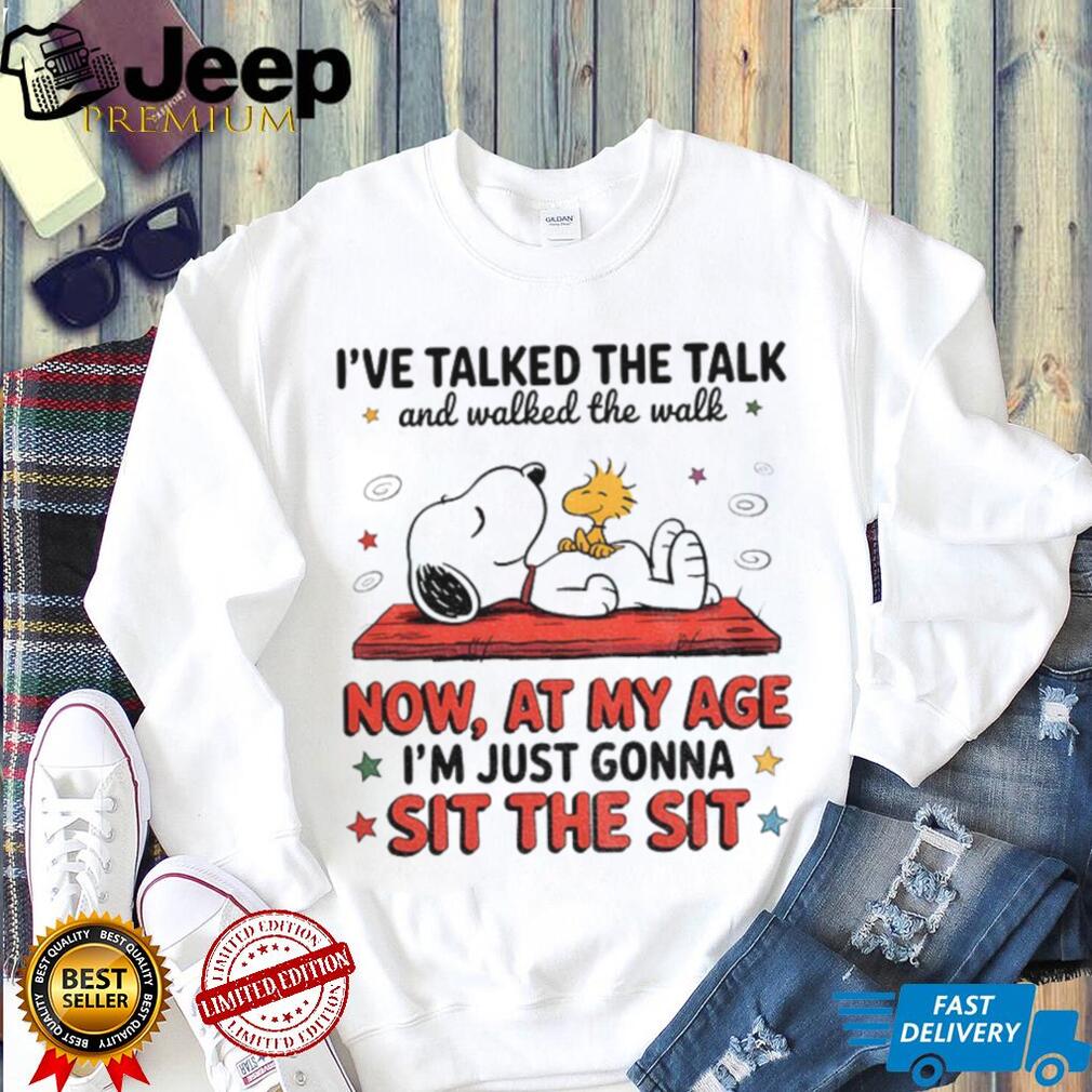 Person wearing Snoopy and Woodstock aging humor t-shirt