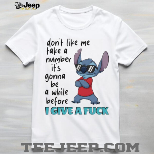 Stitch don’t like me take a number it’s gonna be a while before I give a fuck shirt