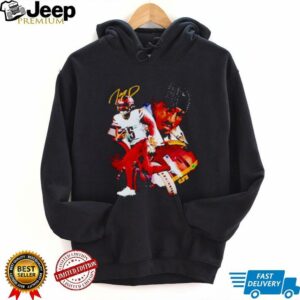 Washington Commanders football player running with the ball shirt