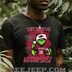 Custom Name Arkansas Razorbacks Grinch Holiday Shirt – NCAA Football Fan Tee – Xmas Gift “They Hate Us Because They Ain’t Us”