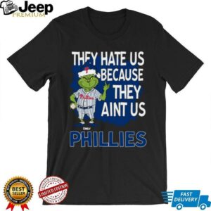 Custom Philadelphia Phillies Grinch Christmas Tee, Funny Santa Baseball Shirt with Quote They Hate Us Ain’t Us, MLB Fan Gift