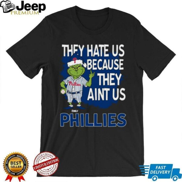 Custom Philadelphia Phillies Grinch Christmas Tee, Funny Santa Baseball Shirt with Quote They Hate Us Ain’t Us, MLB Fan Gift