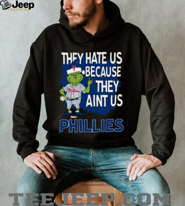 Custom Philadelphia Phillies Grinch Christmas Tee, Funny Santa Baseball Shirt with Quote They Hate Us Ain’t Us, MLB Fan Gift