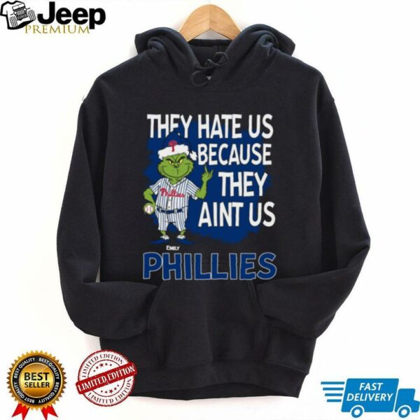 Custom Philadelphia Phillies Grinch Christmas Tee, Funny Santa Baseball Shirt with Quote They Hate Us Ain’t Us, MLB Fan Gift
