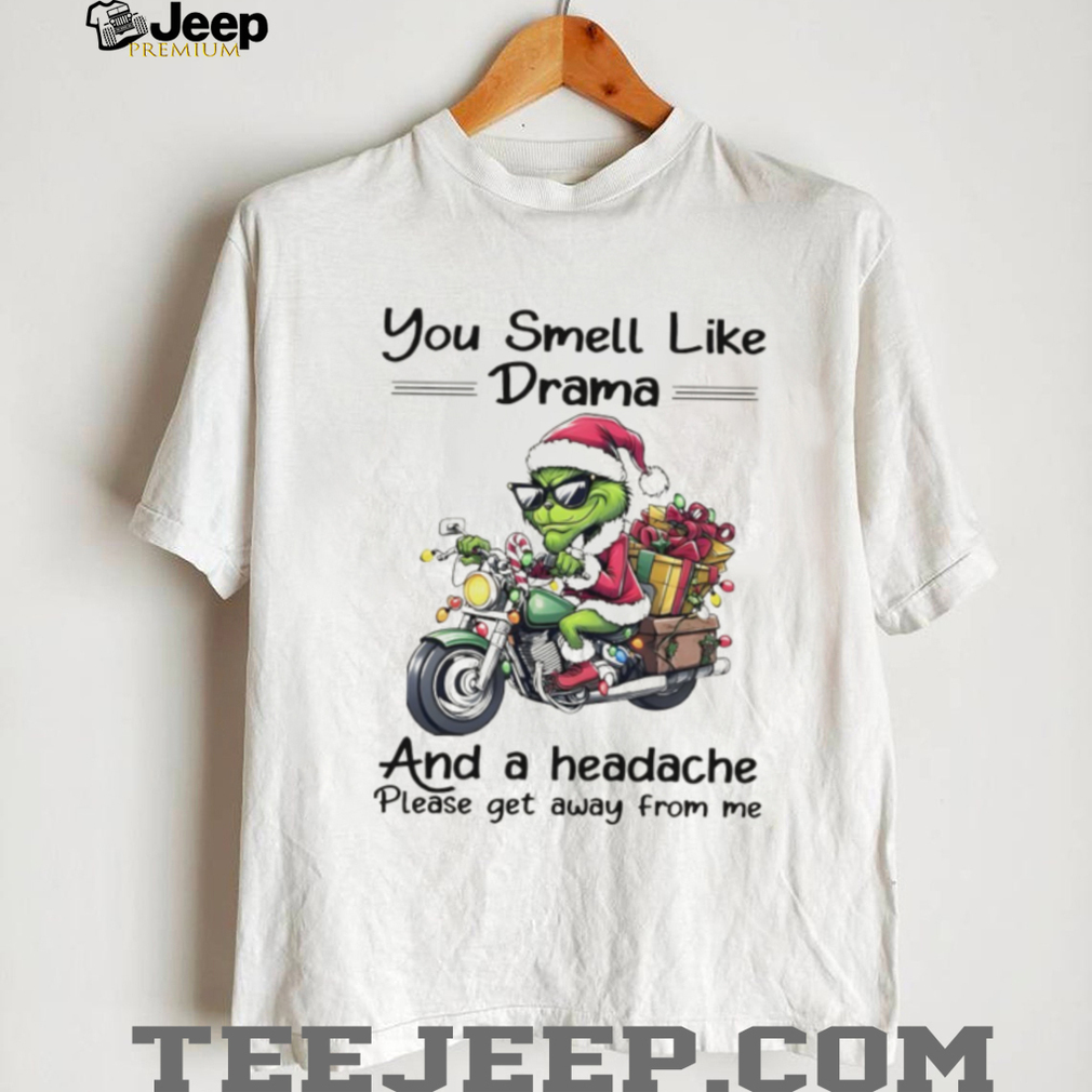 Person wearing a sarcastic Grinch 'drama and headache' Christmas tee