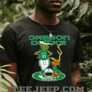 Oregon Ducks Custom Name Grinch with Dog Christmas Shirt – NCAA Football Tee – Personalized Holiday Gift for Fans & Supporters
