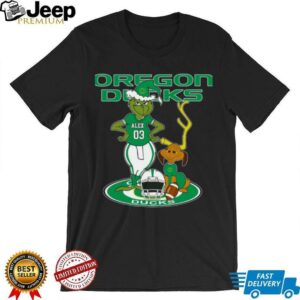 Oregon Ducks Custom Name Grinch with Dog Christmas Shirt – NCAA Football Tee – Personalized Holiday Gift for Fans & Supporters