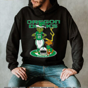 Oregon Ducks Custom Name Grinch with Dog Christmas Shirt – NCAA Football Tee – Personalized Holiday Gift for Fans & Supporters