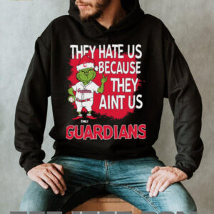 Personalized Cleveland Guardians Grinch Christmas Tee, Funny Santa Baseball Shirt with Quote They Hate Us Ain’t Us, MLB Fan Gift