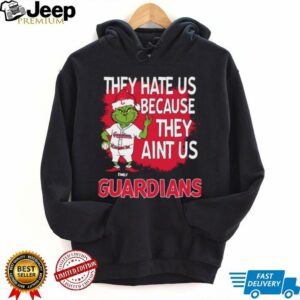 Personalized Cleveland Guardians Grinch Christmas Tee, Funny Santa Baseball Shirt with Quote They Hate Us Ain’t Us, MLB Fan Gift
