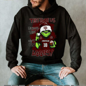Texas A&M Aggies Custom Name Grinch Christmas Shirt – Personalized NCAA Football Tee – Quote Holiday Gift “They Hate Us Because They Ain’t Us”