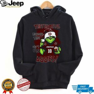 Texas A&M Aggies Custom Name Grinch Christmas Shirt – Personalized NCAA Football Tee – Quote Holiday Gift “They Hate Us Because They Ain’t Us”