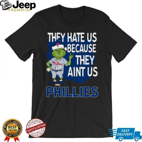 Custom Philadelphia Phillies Grinch Christmas Tee, Funny Santa Baseball Shirt with Quote They Hate Us Ain’t Us, MLB Fan Gift