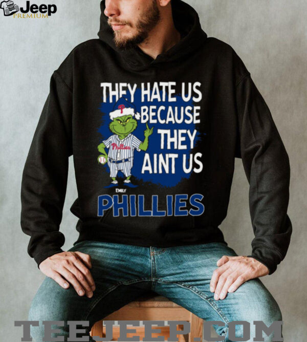 Custom Philadelphia Phillies Grinch Christmas Tee, Funny Santa Baseball Shirt with Quote They Hate Us Ain’t Us, MLB Fan Gift