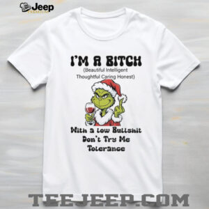 Grinch Santa hat middle finger I’m a bitch with a low bullshit don’t try me tolerance Christmas shirt