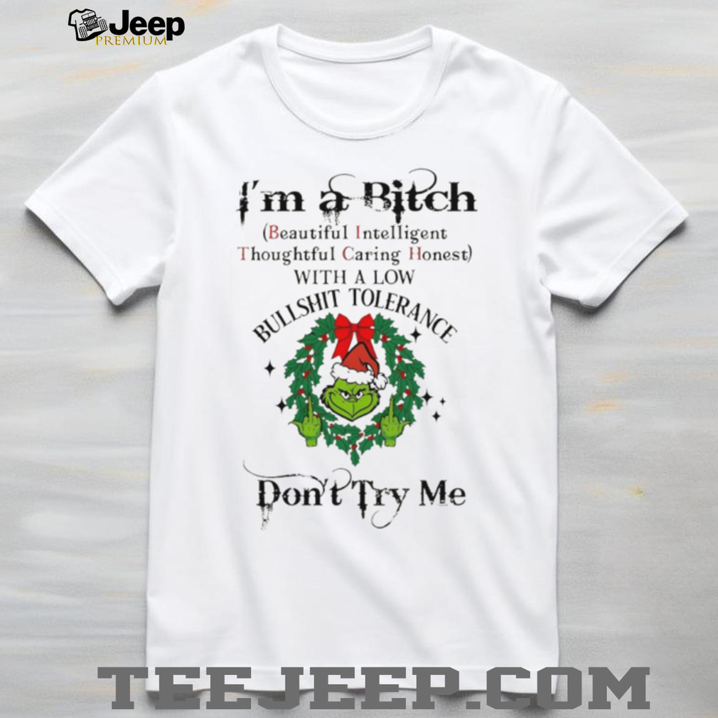Grinch big face middle finger Santa hat I’m a bitch beautiful intelligent thoughtful caring honest with a low Christmas shirt