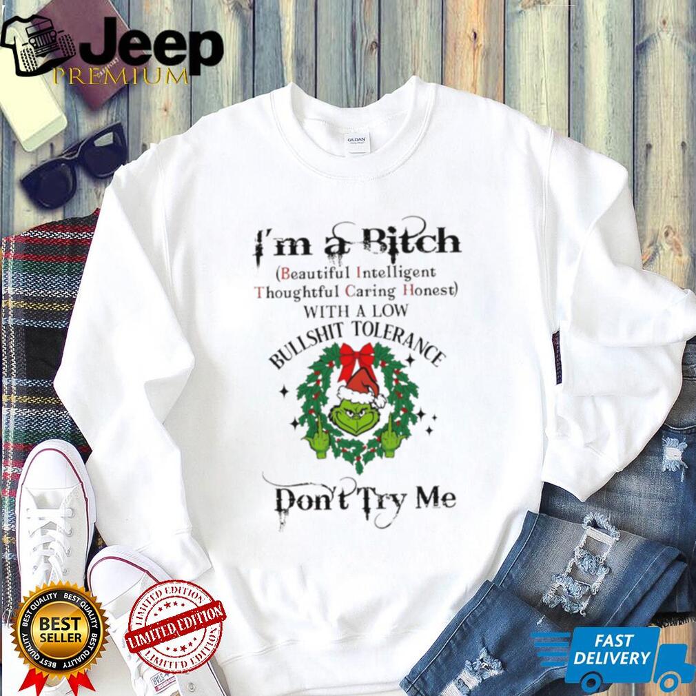 Grinch big face middle finger Santa hat I’m a bitch beautiful intelligent thoughtful caring honest with a low Christmas shirt