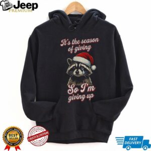Raccoon Santa hat it’s the season of giving so I’m giving up Christmas shirt
