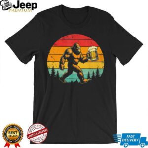 Retro Bigfoot Carrying Beer Mug Sunset Forest Silhouette T Shirt Retro Bigfoot Carrying Beer Mug Sunset Forest Silhouette T Shirt