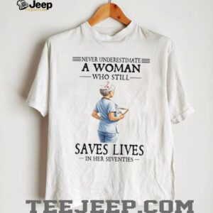 Never Underestimate A Woman Who Still Saves Lives Seventies Nurse Tee Never Underestimate A Woman Who Still Saves Lives Seventies Nurse Tee