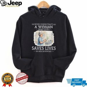 Never Underestimate A Woman Who Still Saves Lives Nurse 70s T Shirt