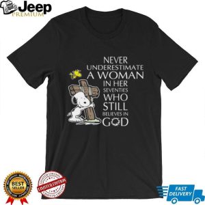 Snoopy Hugging Cross Never Underestimate A Woman In Her 70s T Shirt Snoopy Hugging Cross Never Underestimate A Woman In Her 70s T Shirt